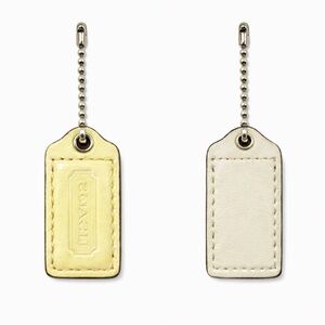 Coach Hangtag, 2 -sided; light yellow/white; silver ball chain; 1.5”